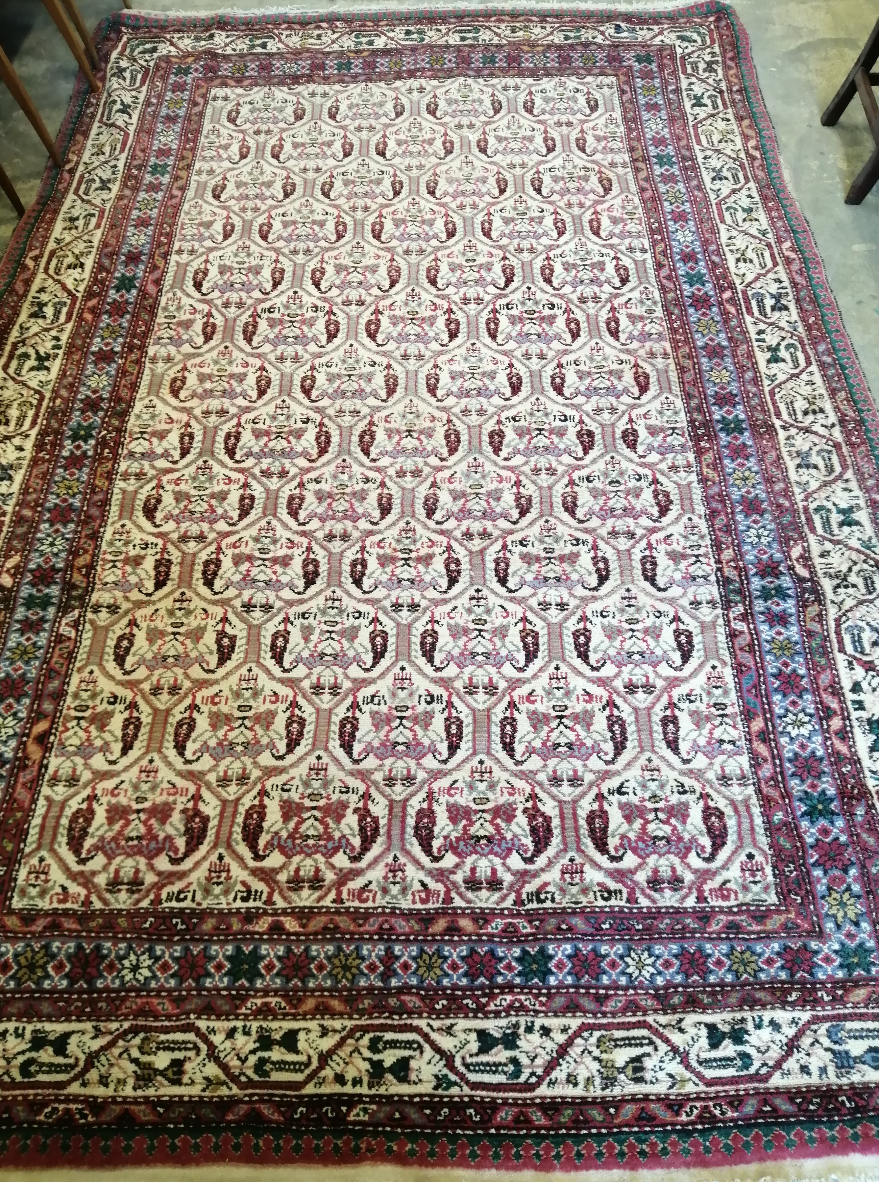 A North West Persian ivory ground carpet, 300 x 198cm